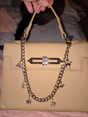 Elegant Leather Cream Top-Handle Crossbody Satchel with Chain Charm Detail